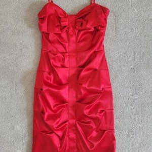 Red mini dress with bow.